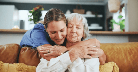 Caregiver supporting elderly woman at home in Liberty Township, Ohio